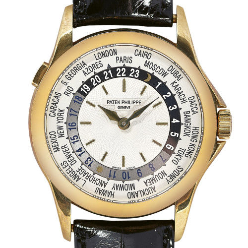 PATEK PHILIPPE : Gentleman's wristwatch 'World Time' (DOBIASCHOFSKY AUKTIONEN AG)