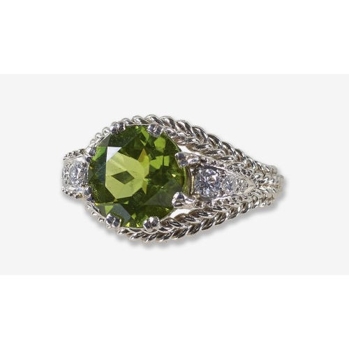 PERIDOT-DIAMANT-RING : Um 1940 (DOBIASCHOFSKY AUKTIONEN AG)