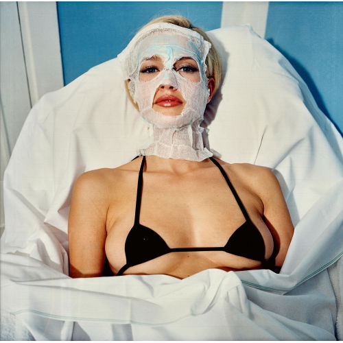 BETTINA RHEIMS : 'Karen Mulder with a very small Chanel bra' (DOBIASCHOFSKY AUKTIONEN AG)